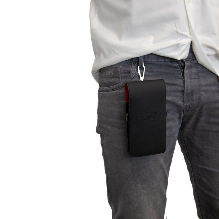 Bull's Space Case Hard black dart case attached to trousers using its carry clip for convenient transport during darts tournaments.