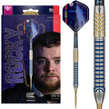 Target Josh Rock G1 90% Tungsten Swiss Point Darts 23g showing the official packaging box alongside a close-up of the blue and gold dart barrel, highlighting its precision-milled grip design.